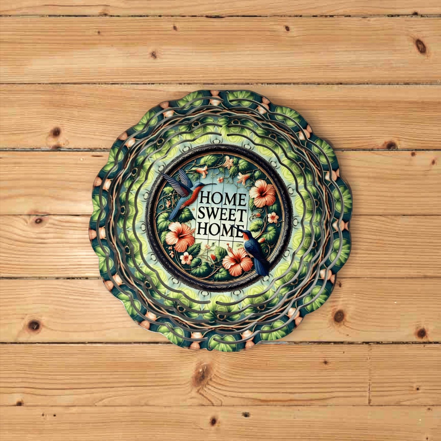 Decorative plate with 'Home Sweet Home' text on a 8-Inch Wind Spinner