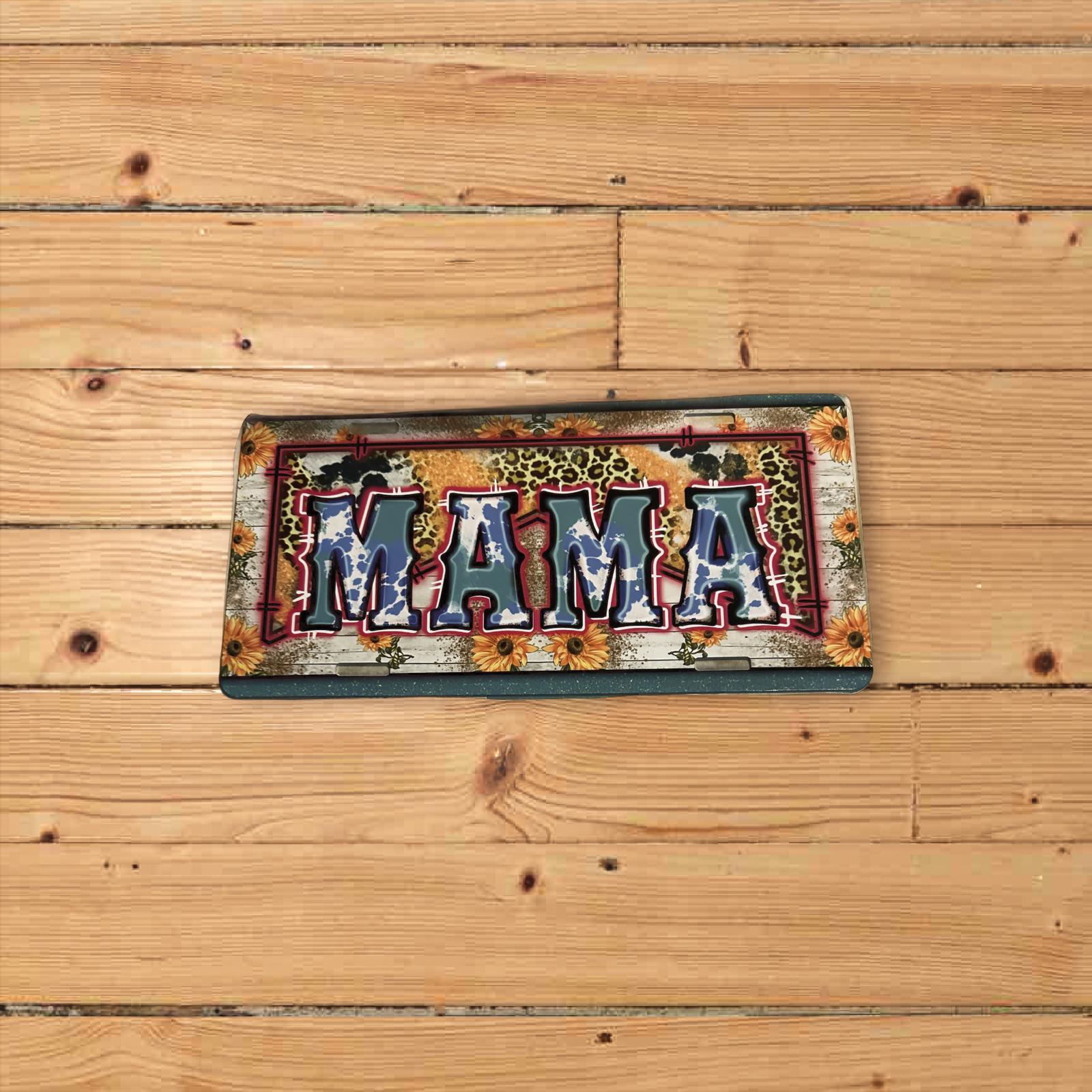 Custom metal license plate with black embossed letters reading "MAMA"